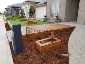 Front Decking with Garden Box and Cladded Retaining Wall